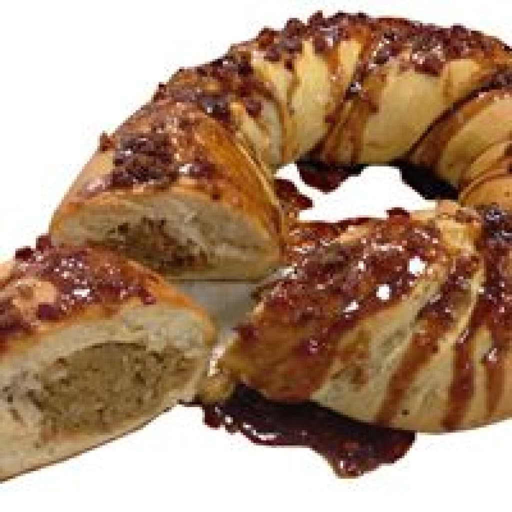Boudin King Cake with Pepper Jack, Steens Syrup, Pepper Jelly, and Bacon